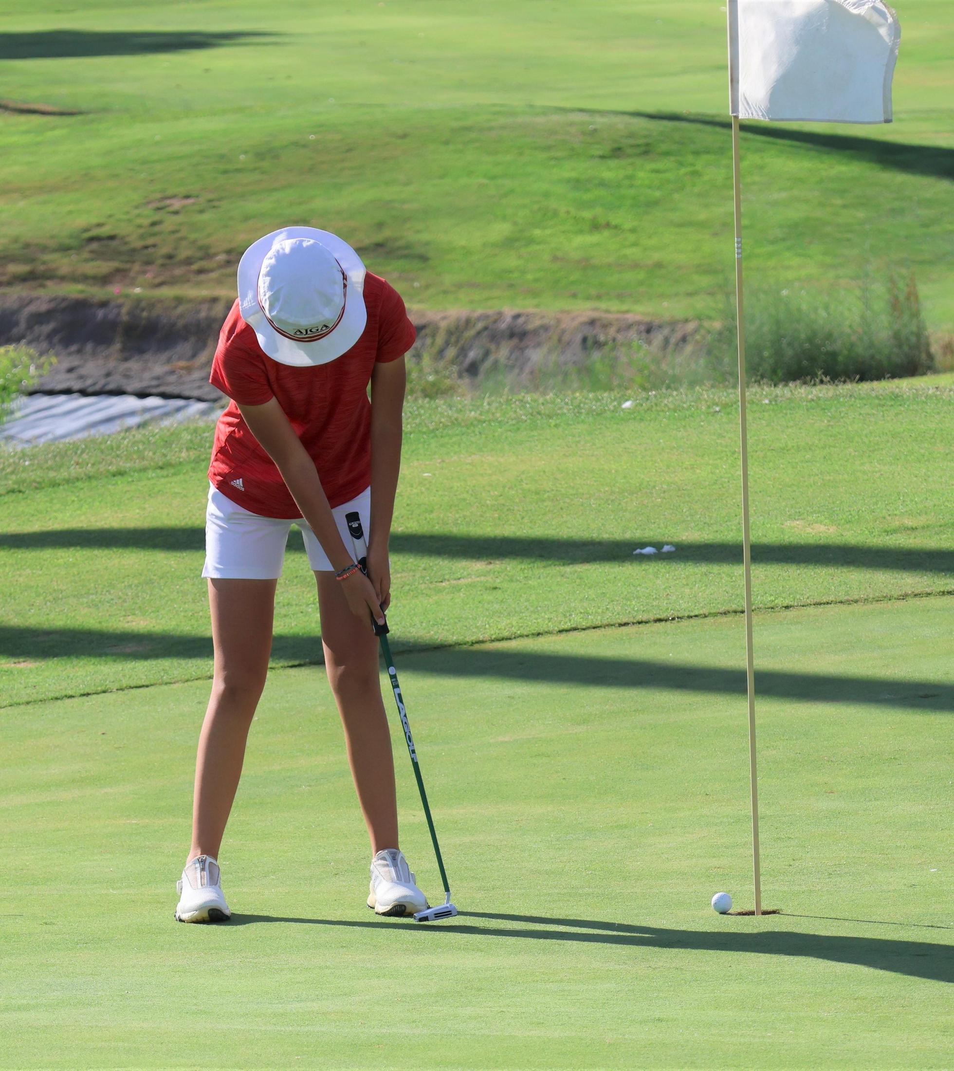 girls playing golf on the pheasant run course