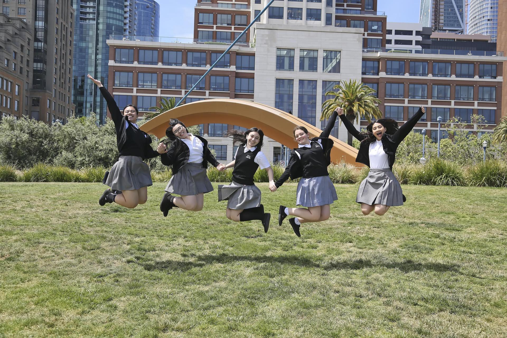 girls jumping