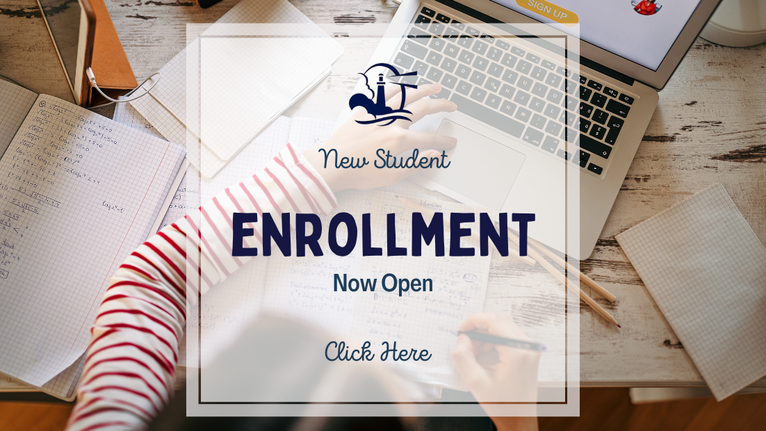 Desk with hands writing notes for enrollment details and a laptop. Information on note reads: New Student Enrollment - Now open; click here.
