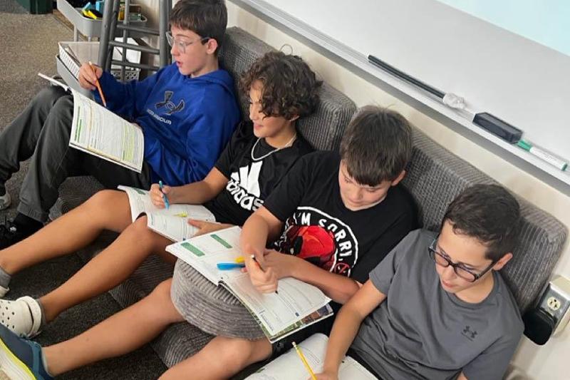 Gionaddi Cameron, Decklen Cosentino, Calix Hensler, and Issac Nahory work together in the new flexible seating