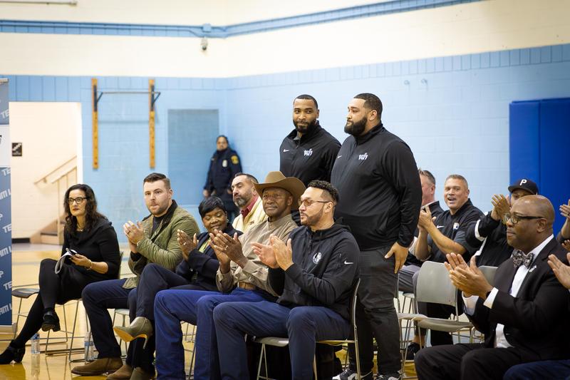 Ty Brown and Jullian Turner stand to be recognized