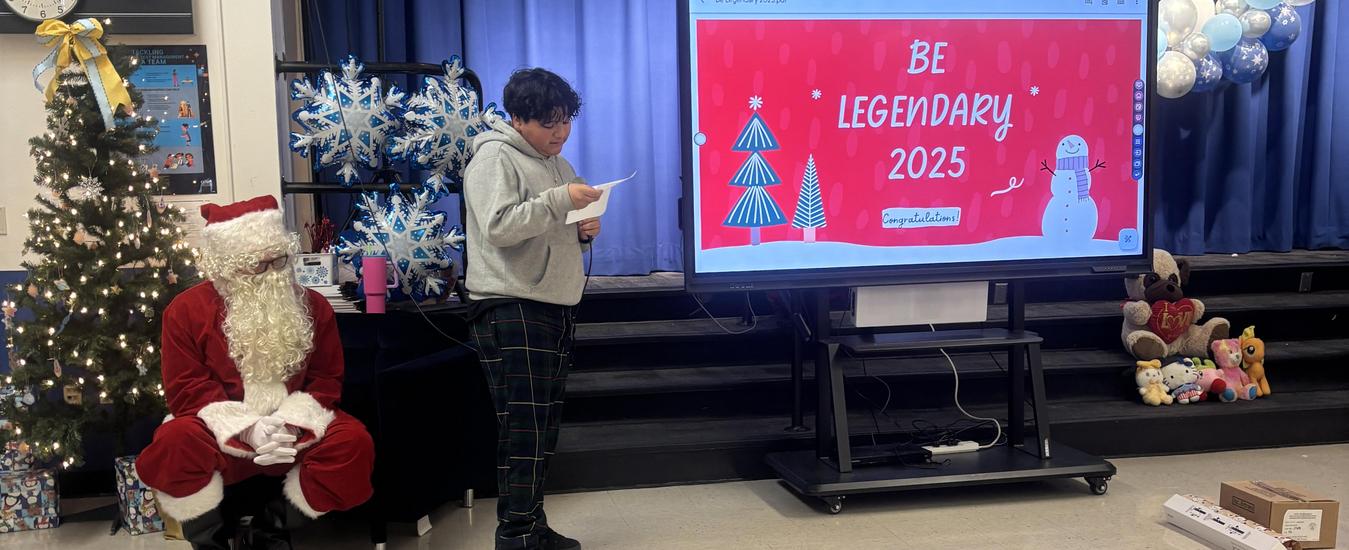 Student Council President gives a speech during Be Legendary celebration.