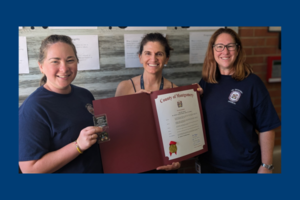 Head of School receiving proclamation from Montgomery County .