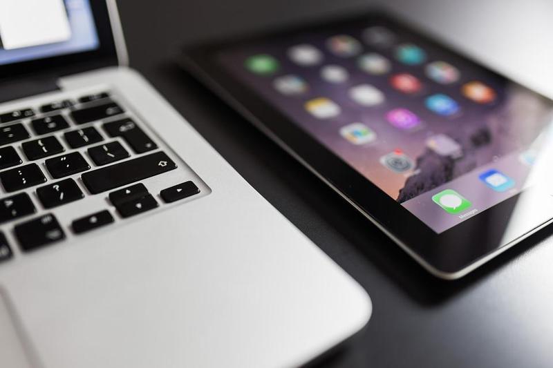 image of laptop keyboard and an iPad