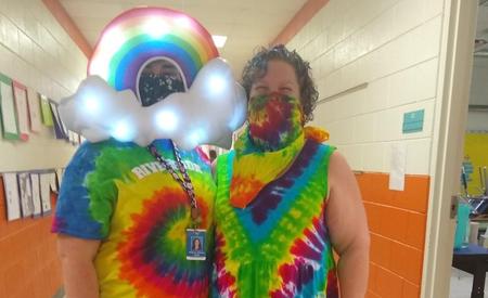 teachers dressed in rainbow