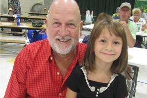 2nd-grader Briar Levkus and her grandfather Richard Levkus