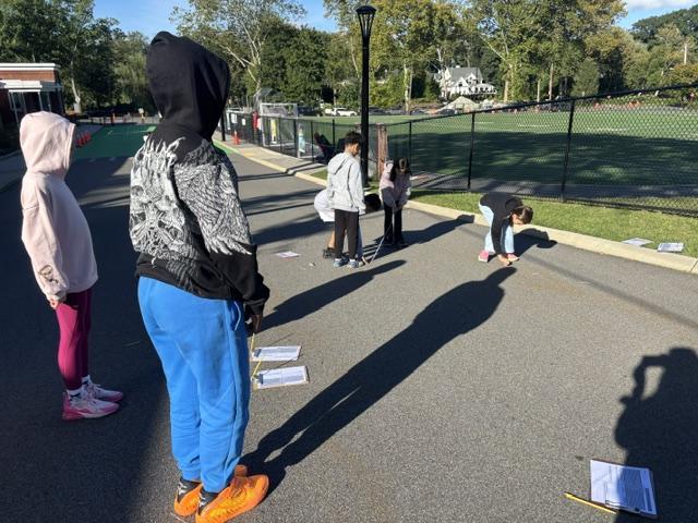 Fifth graders playing shadow tag and measuring shadows this week!!