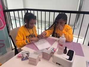 students working on the nails