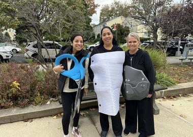 Children and Parent exploring a brain model during career day