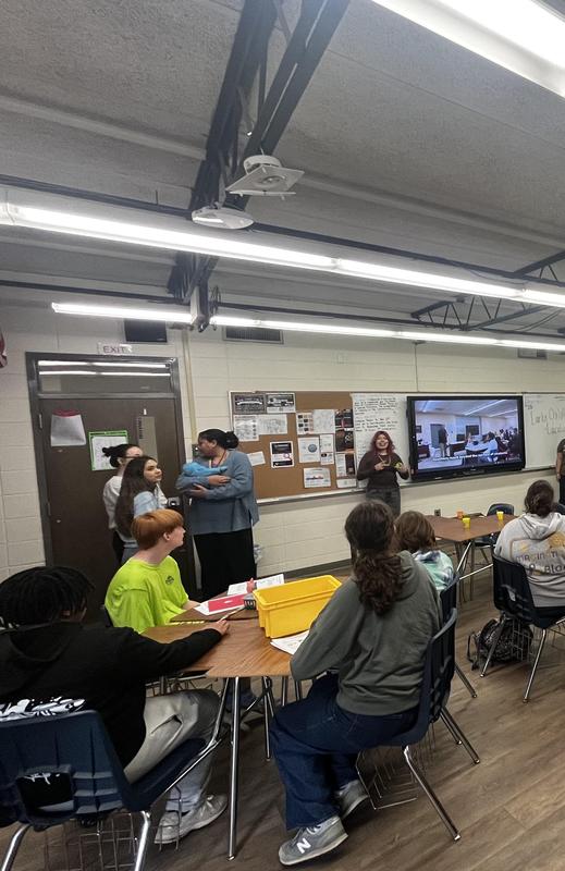 Early Childhood ambassador Daphne Ruiz talks to the ninth graders