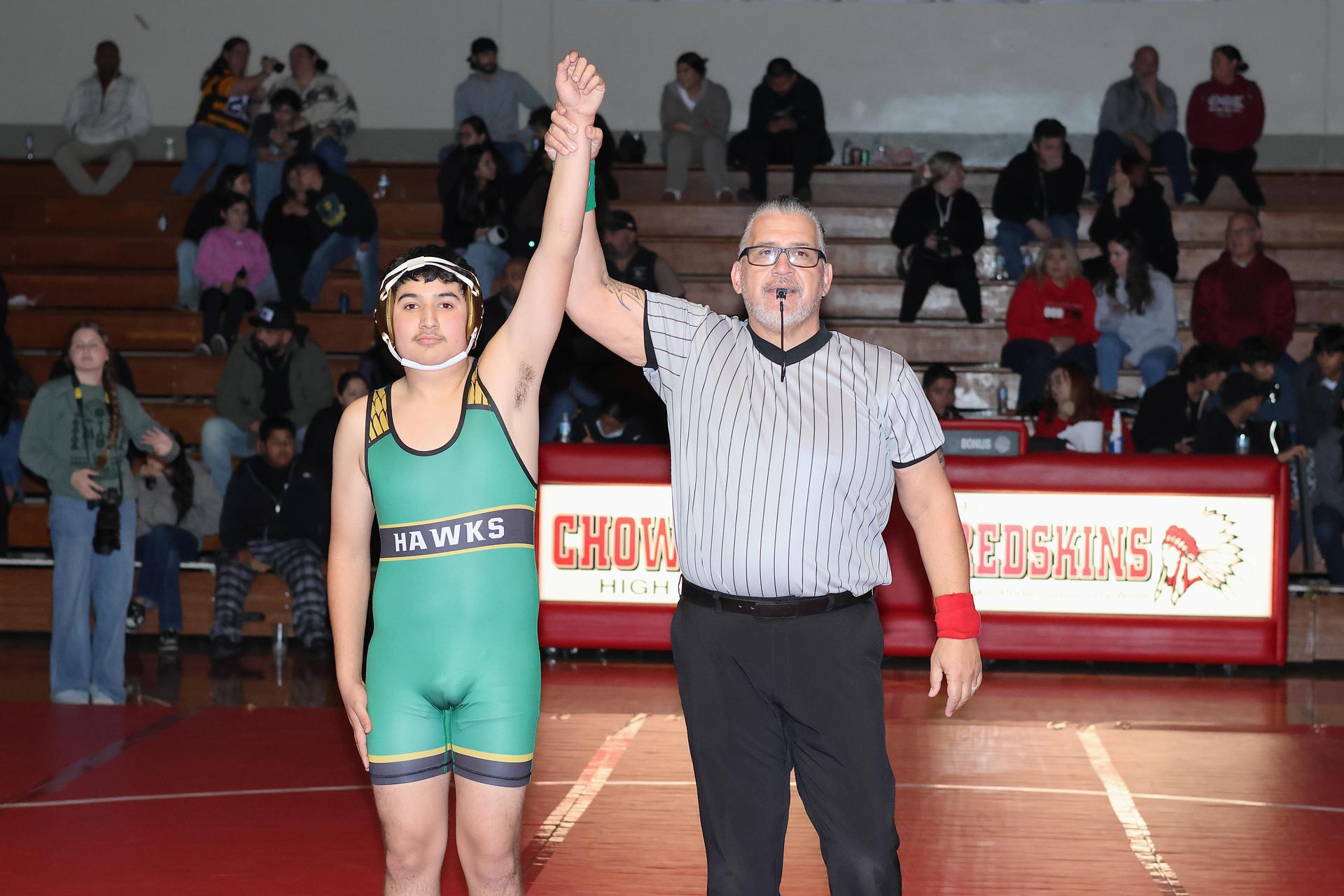 Wrestling winners with hands up 94