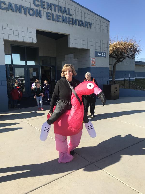 Mrs. Munoz dressed as a flamingo.