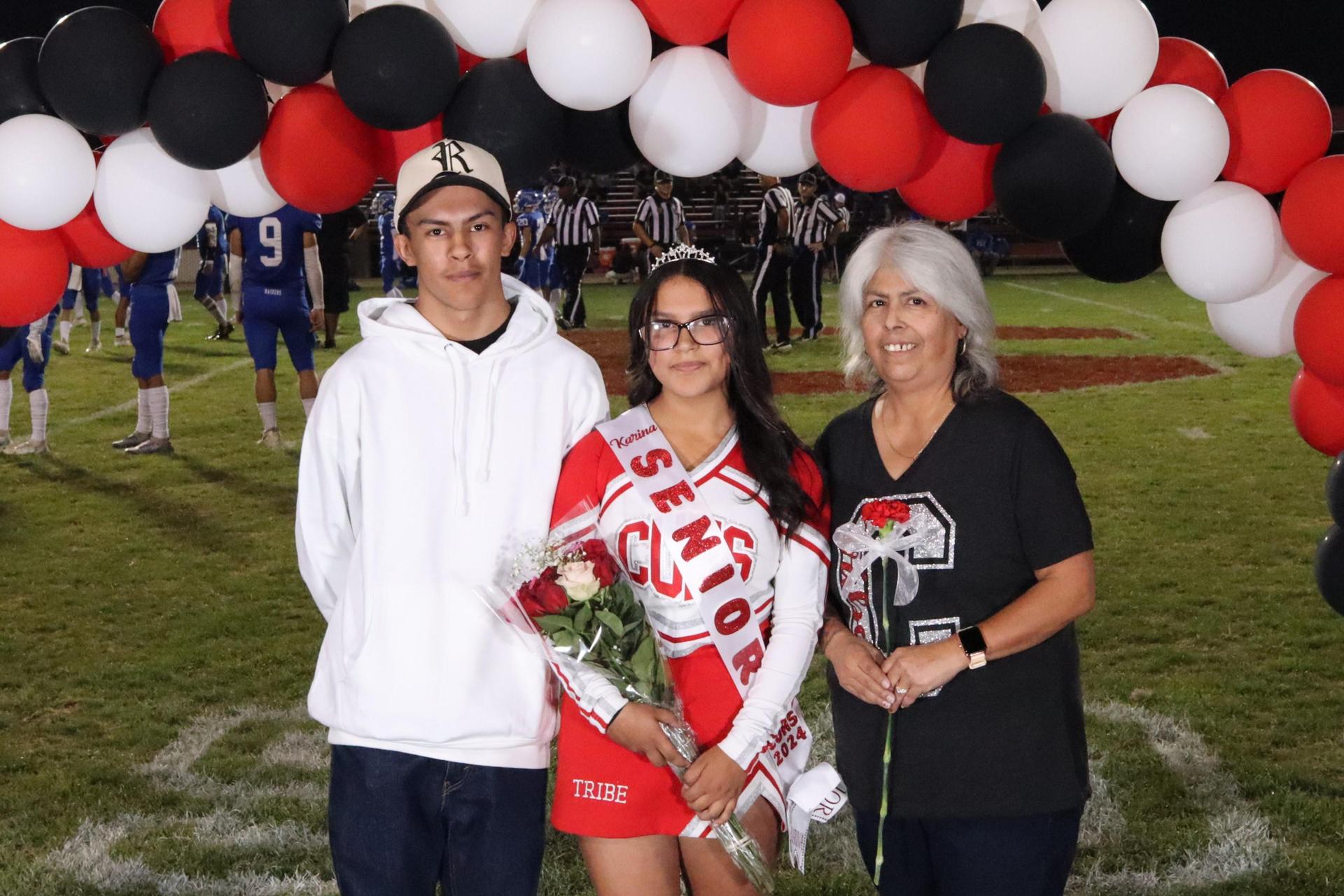 seniors and their escorts celebrating senior night