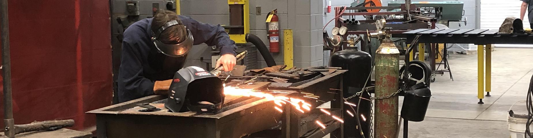 Mr. Langston's Welding Class working on a project.
