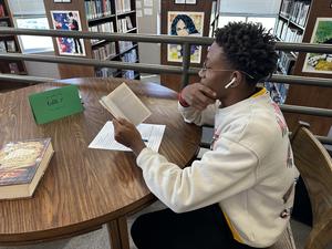 Close up of Leonard reading