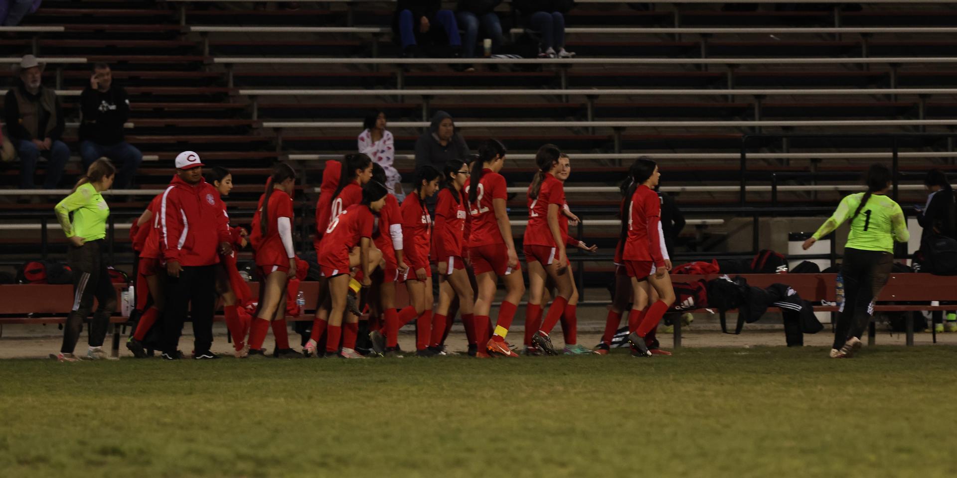 Junior varsity girls playing soccer against liberty