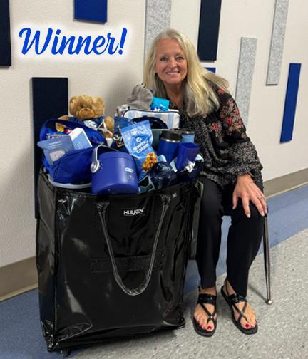 Congrats Dr. Sandra Whitley on winning the PTO Bleed Blue Member Basket! Featured Photo