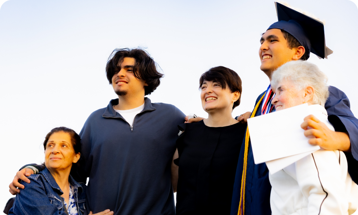 high school graduate with his family