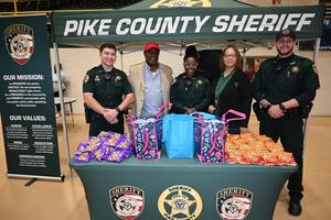 Pike County Sheriff’s Office Deputies Greet Superintendent Dr. Geneva Holmes at Eagles Carnival 2025
