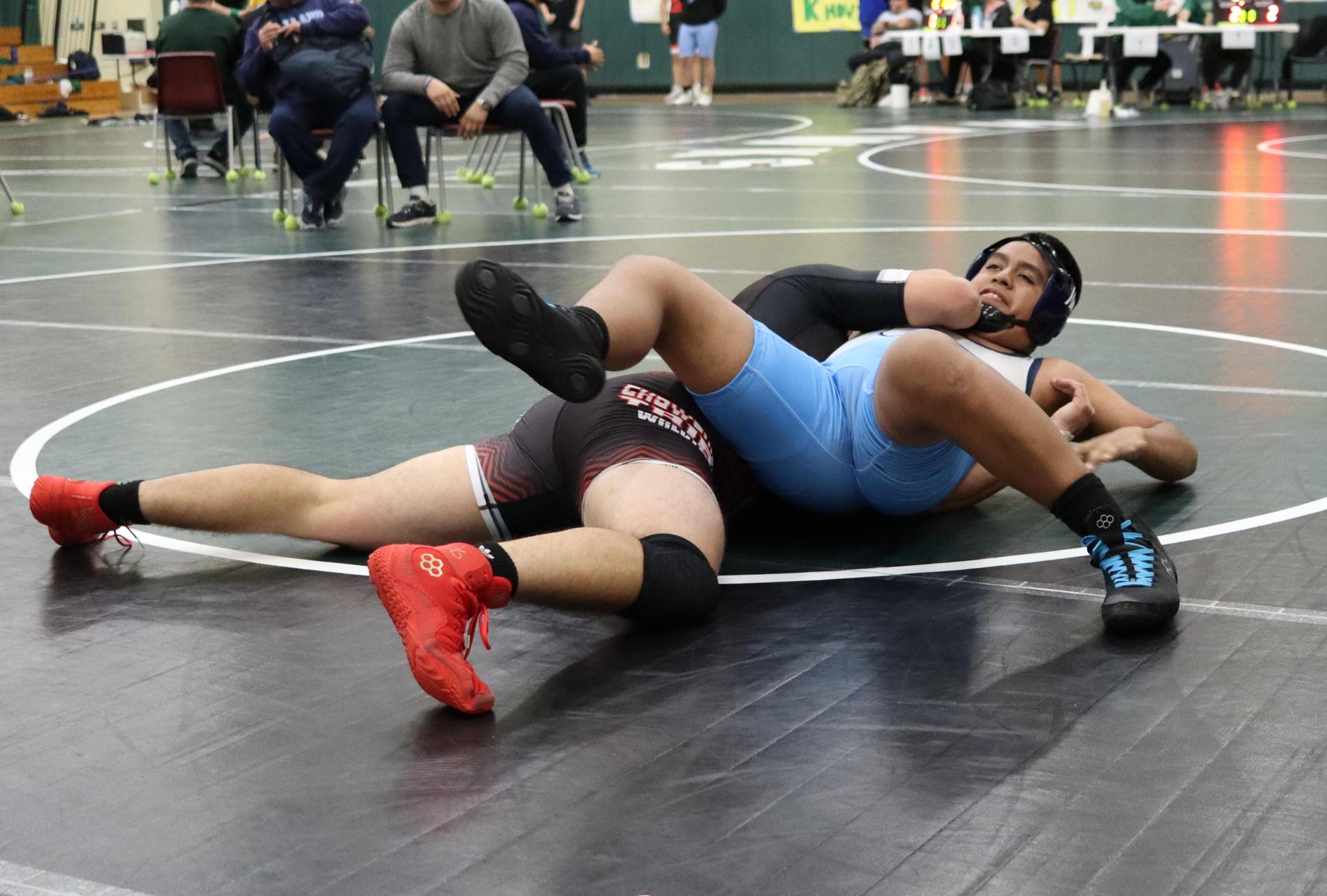 wrestlers in action at the Hawks invitational