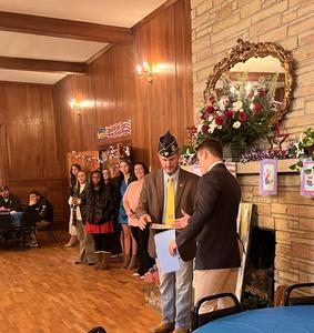 Speakers talking at the breakfast.