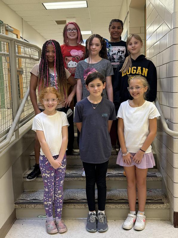 Group of eight girls who will sing in the concert.