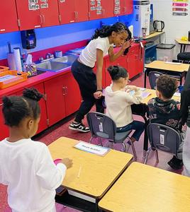 BHS Student sitting with Davis students