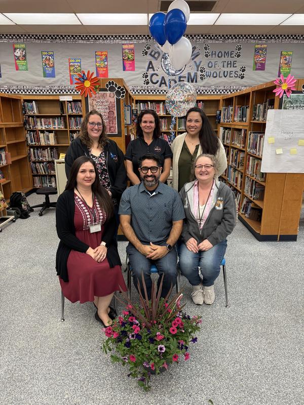 Gerardo Gomez poses for a photo with BP Educators