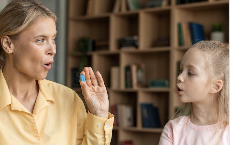 Student works with Speech-Language therapist