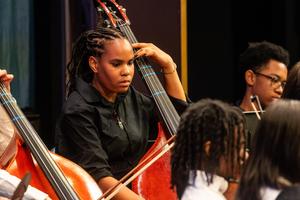 The 8th grade orchestra performs