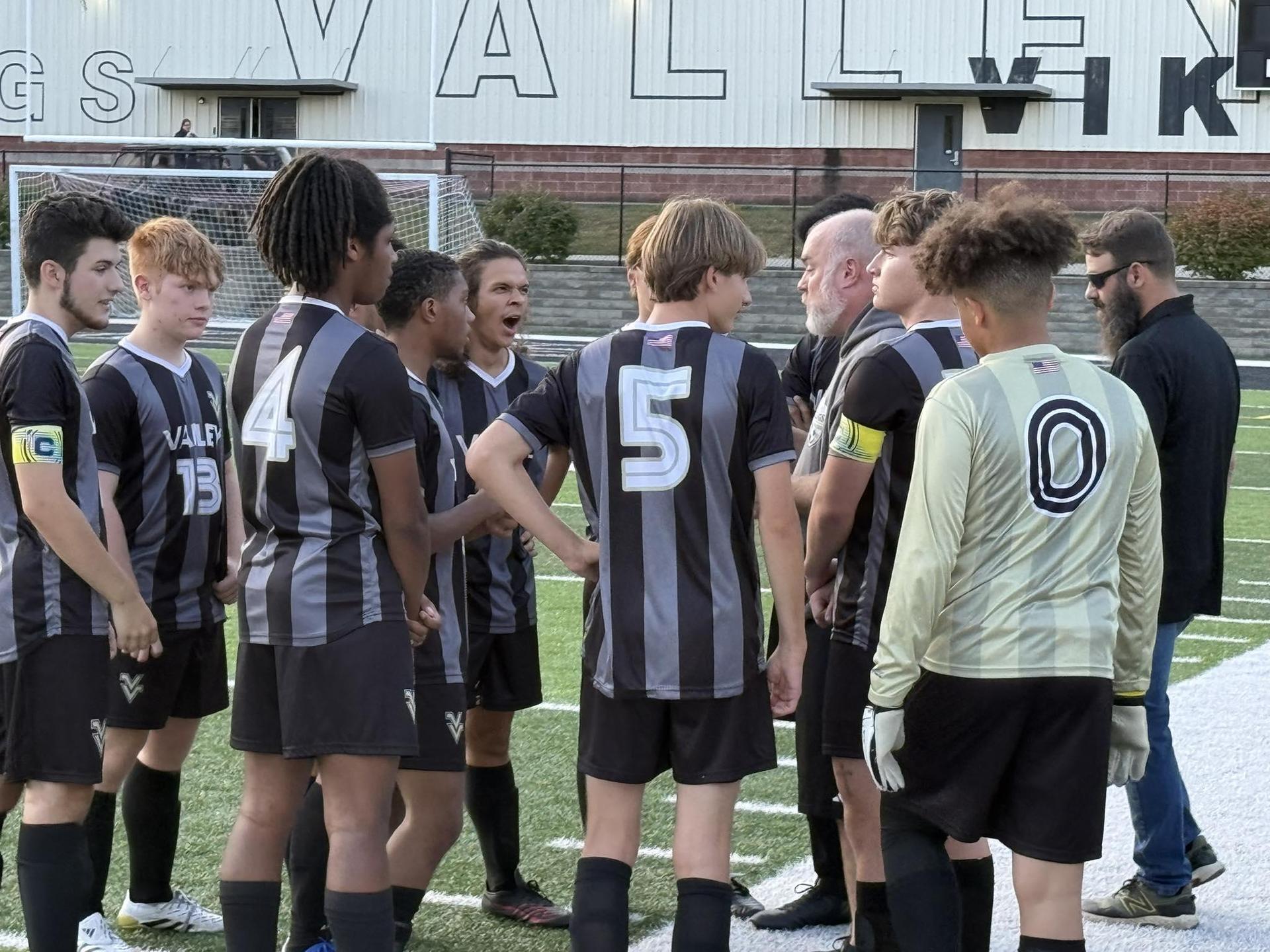 Boys Soccer Huddle