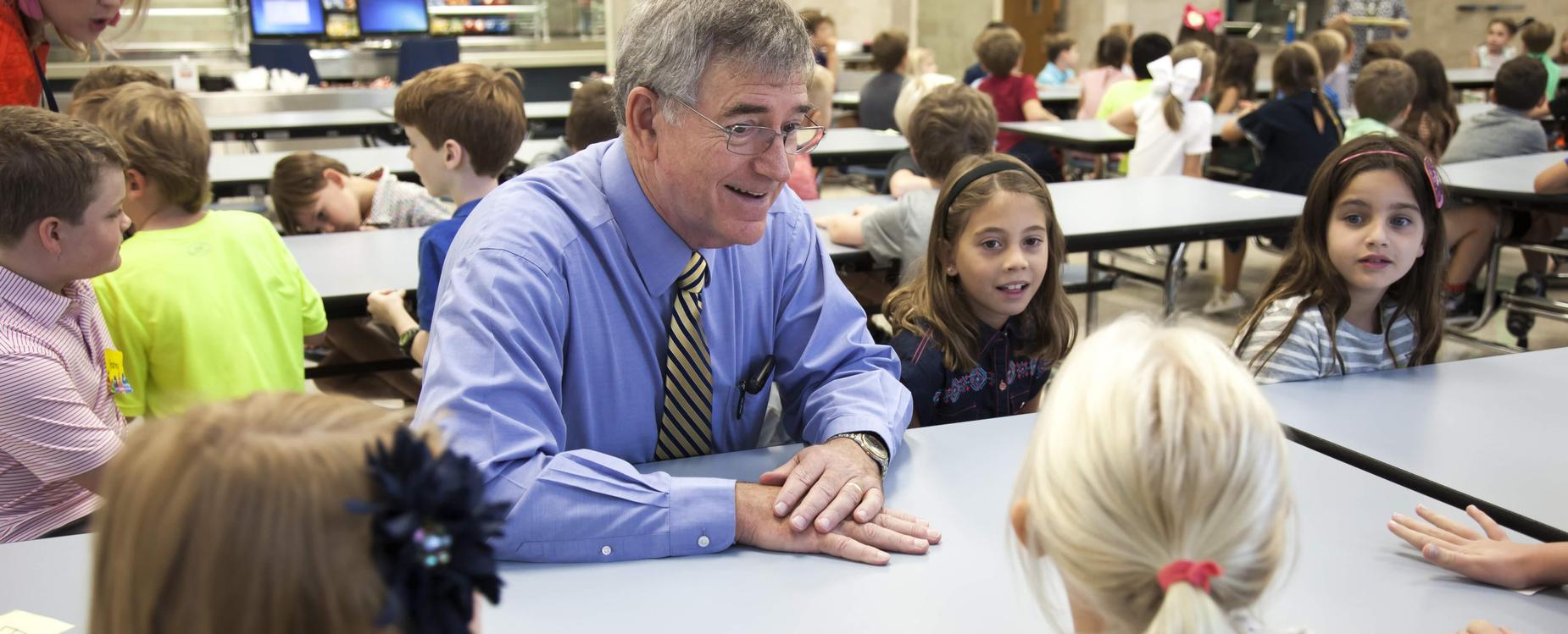 Dr. Trigg and Bradfield students at lunch.