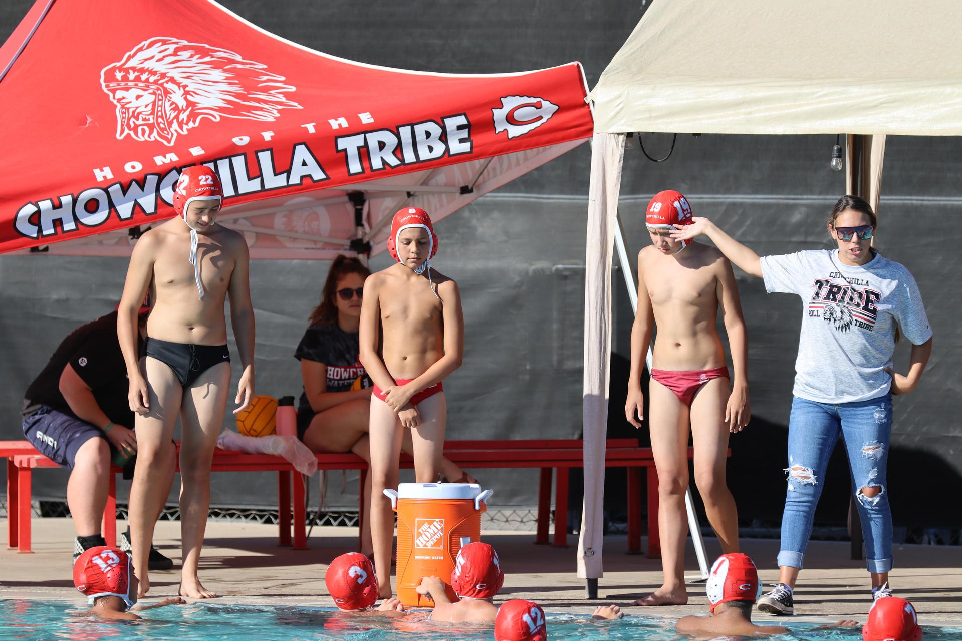boys playing water polo against Madera