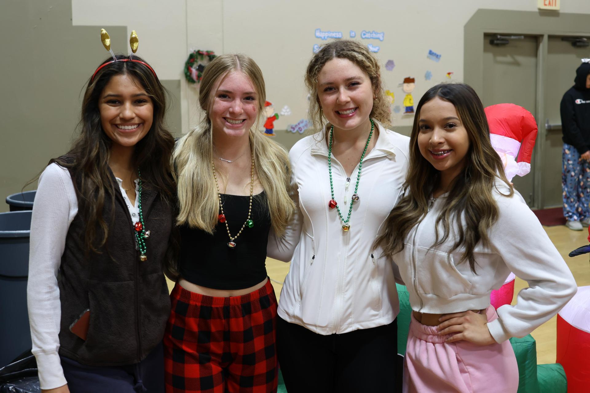 students and staff posing at the winter wishes rally