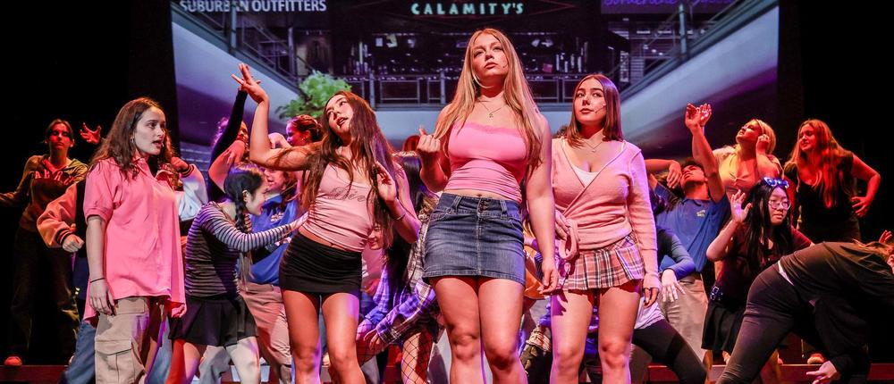 kids on stage in musical production