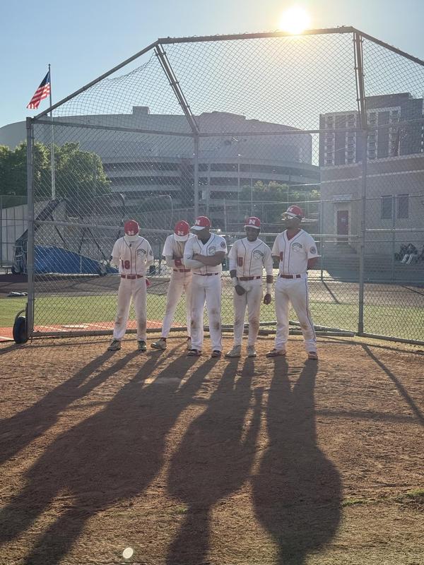 baseball students at the mound