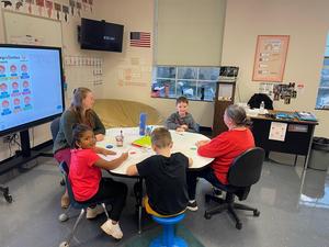 Photos of students and a teacher in a classroom