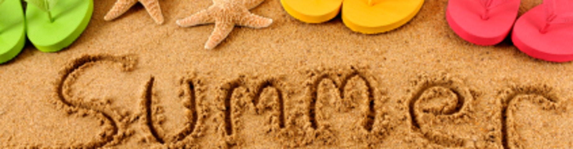 Summer written in the sand