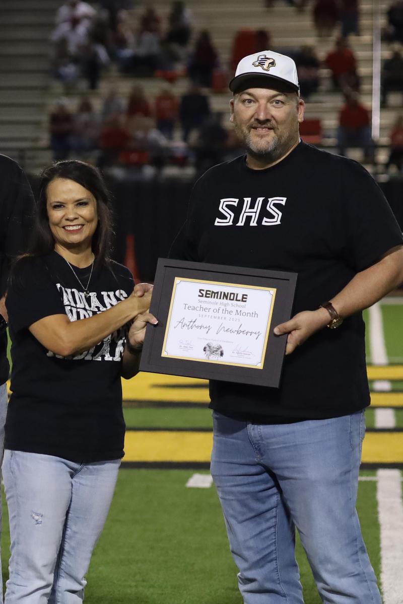 Mr. Anthony Newberry being recognized as September Teacher of the Month
