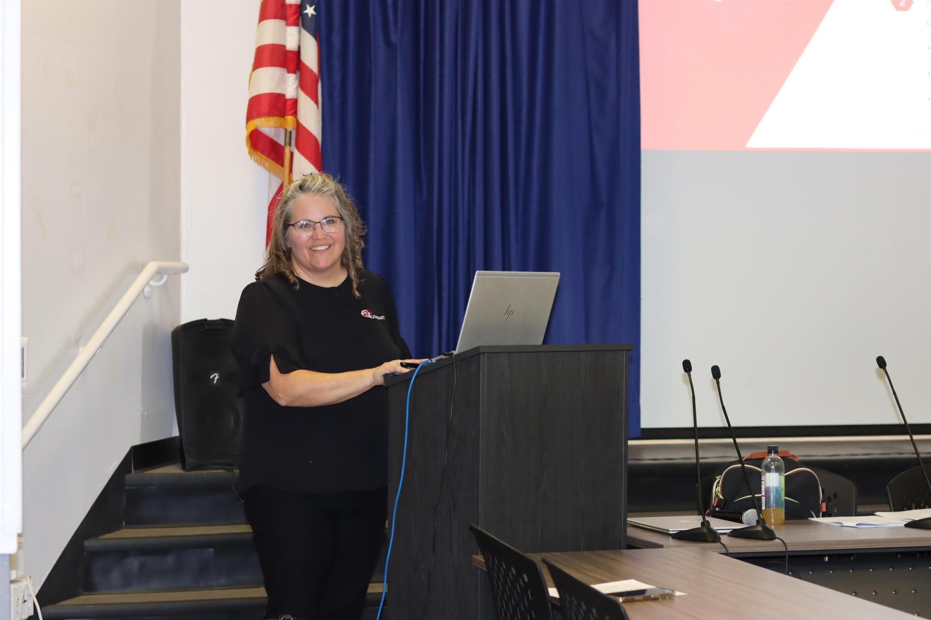 instructor behind podium