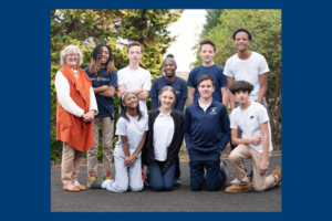 Group of Center School students in 8th grade standing together outside.