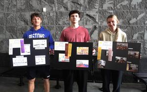 Three students show their MITES projects and state awards.