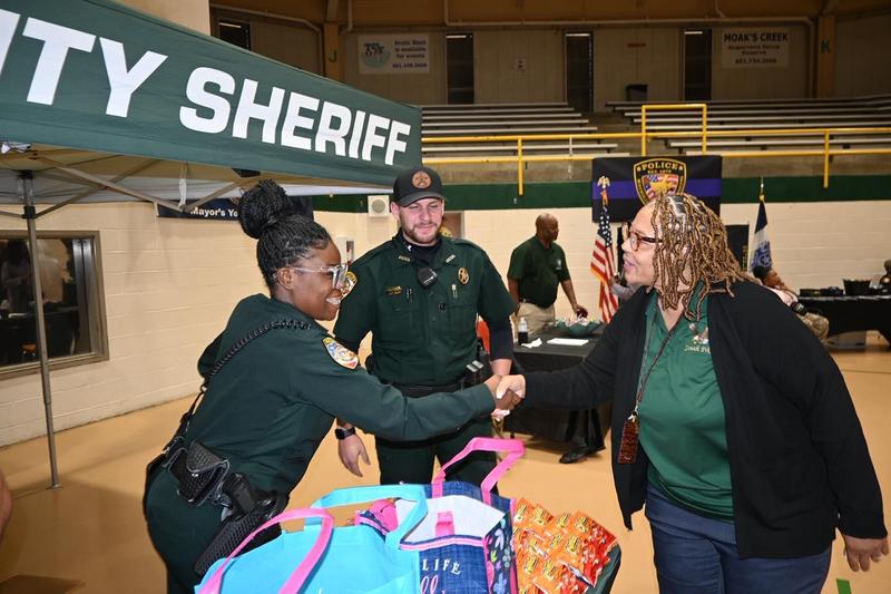 Pike County Sheriff’s Office Deputies Greet Superintendent Dr. Geneva Holmes at Eagles Carnival 2025