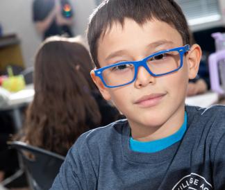 Elementary student in bilingual classroom at Global Village Academy North language immersion school in Thornton Westminster Northglenn Colorado