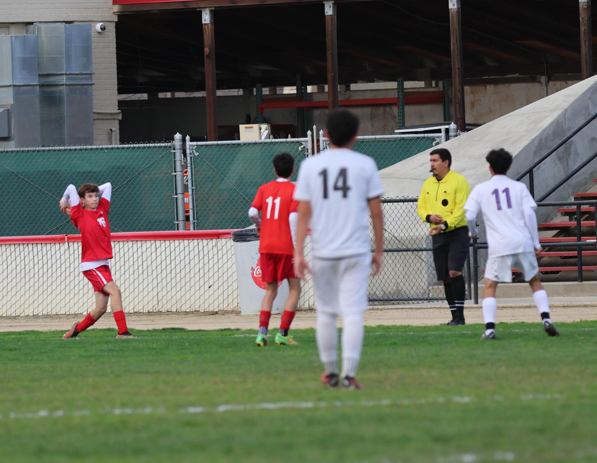 junior varsity boys playing soccer against washington union