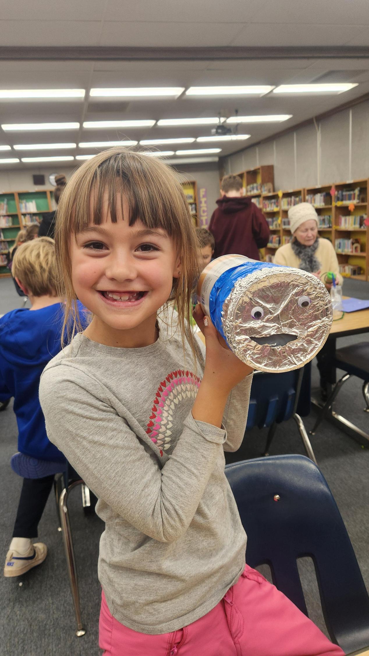 Student showing Maker Space project