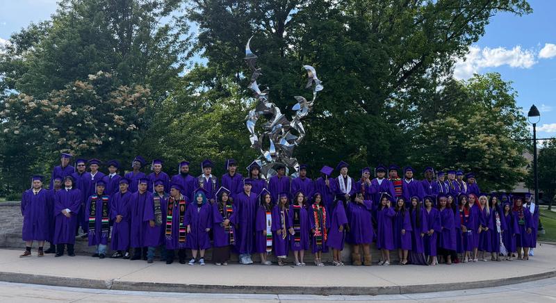 Class picture of Grandview graduates in their caps and gowns