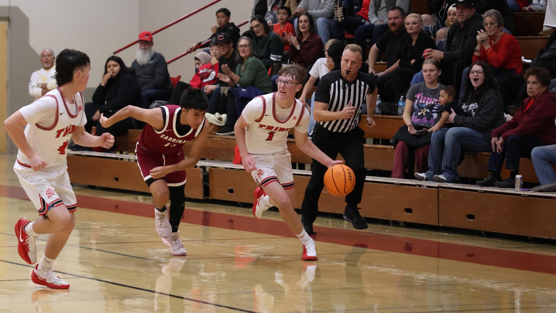 Varsity Boys Basketball playing vs. Orosi 49