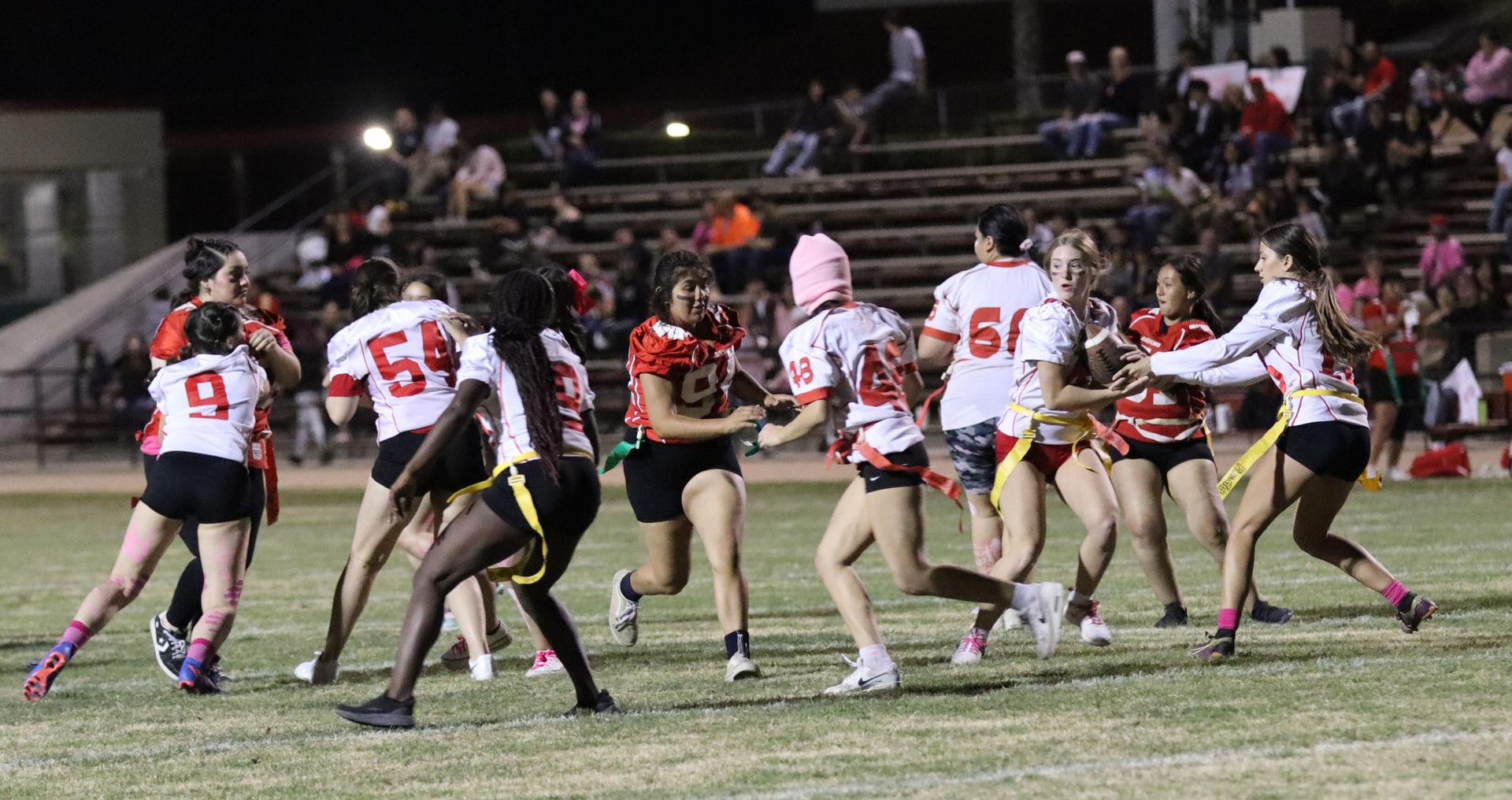 girls playing flag football