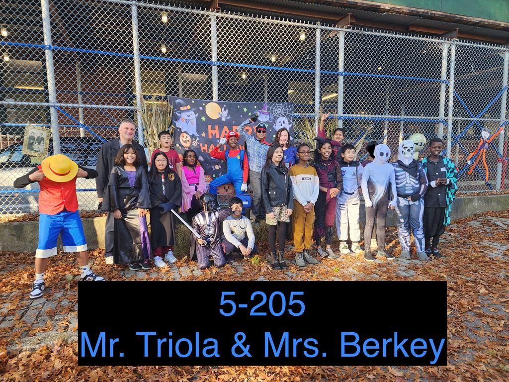 staff and students in halloween costumes